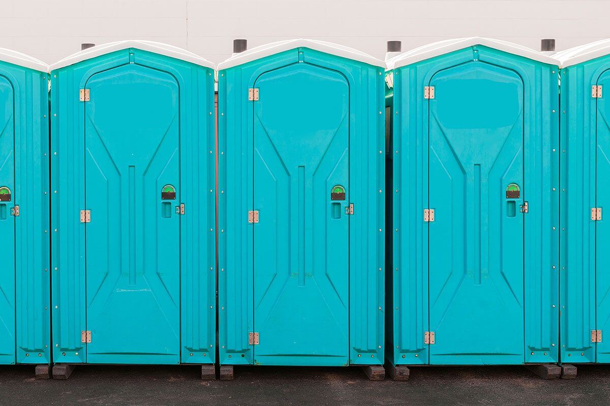 Industrial portable restroom units at a plant in Sequim, Washington